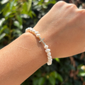 Pulsera Cruz con perlas